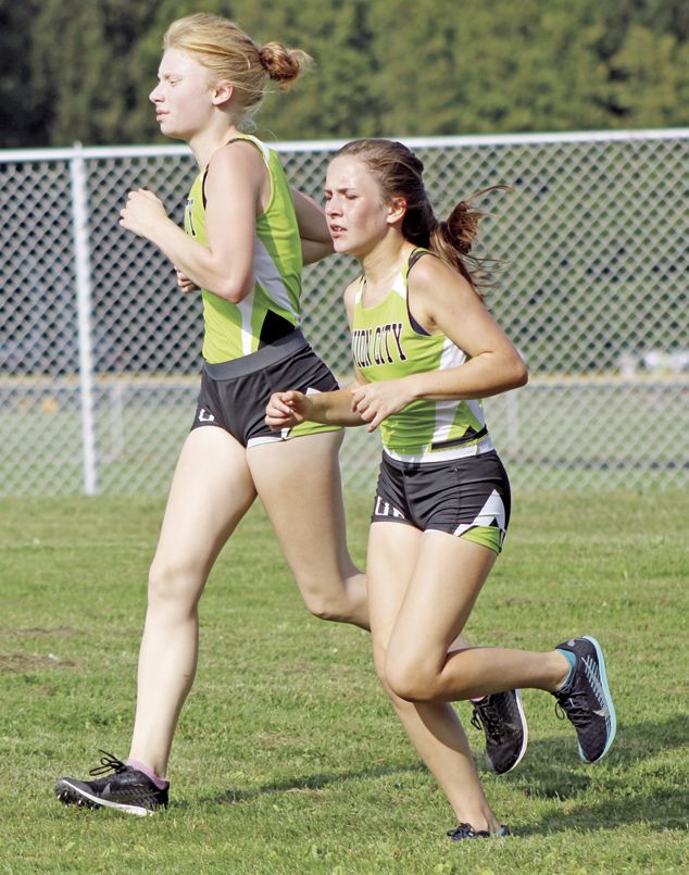 UC’s Brooke Reagle (left) and Sarah Ward finished 3-4.
